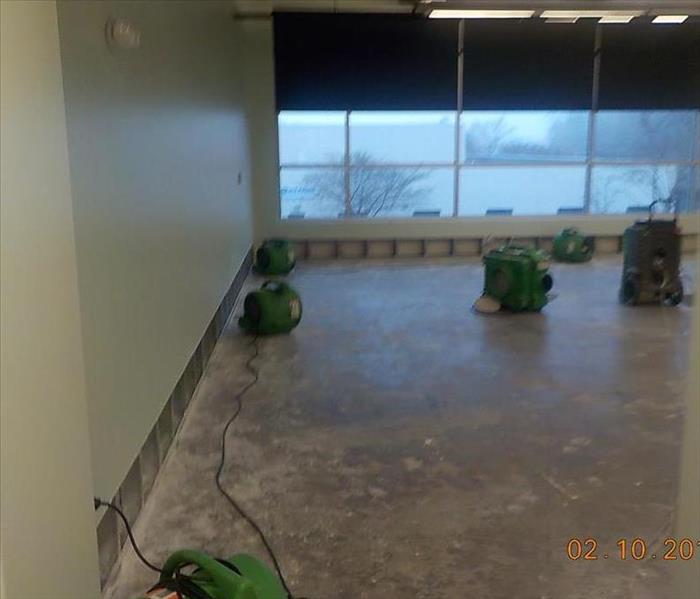 air movers and equipment in use during large commercial water damage